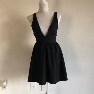 Plunge neckline Black mini dress
